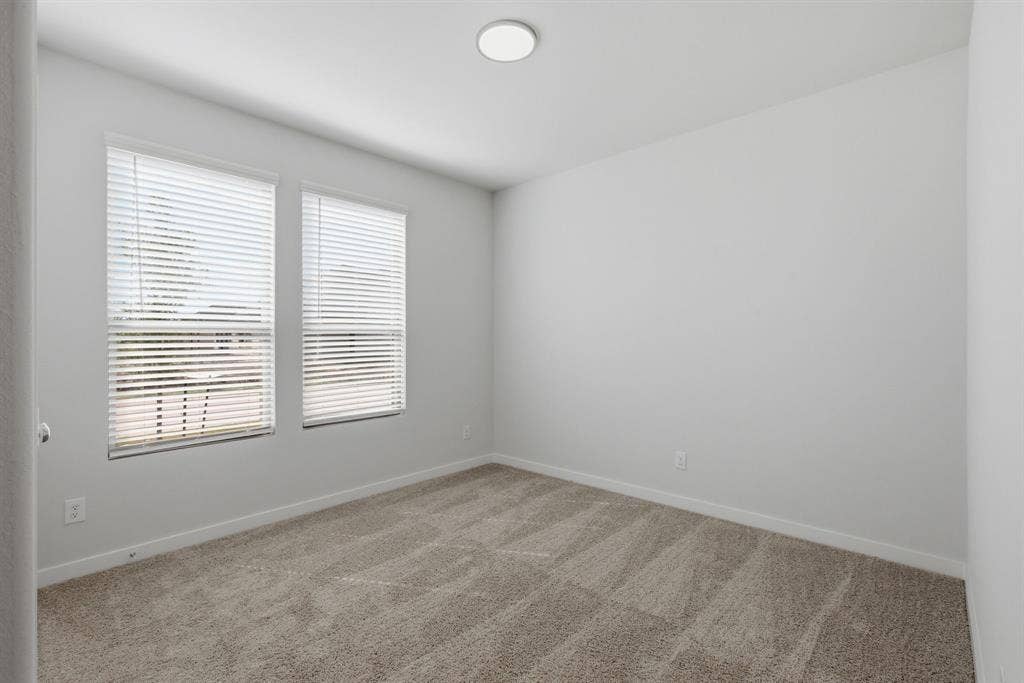 637 Sierra Ridge, Lavon, TX 75166 Recessed ceiling light fixture and two windows with blinds