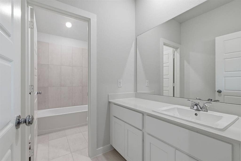 637 Sierra Ridge, Lavon, TX 75166 White vanity with a single basin, chrome faucet, and integrated countertop