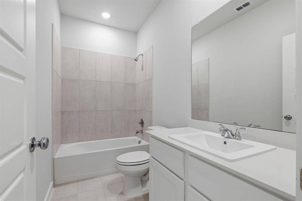 637 Sierra Ridge, Lavon, TX 75166 White vanity with a rectangular undermount sink, a chrome faucet, and a large mirror