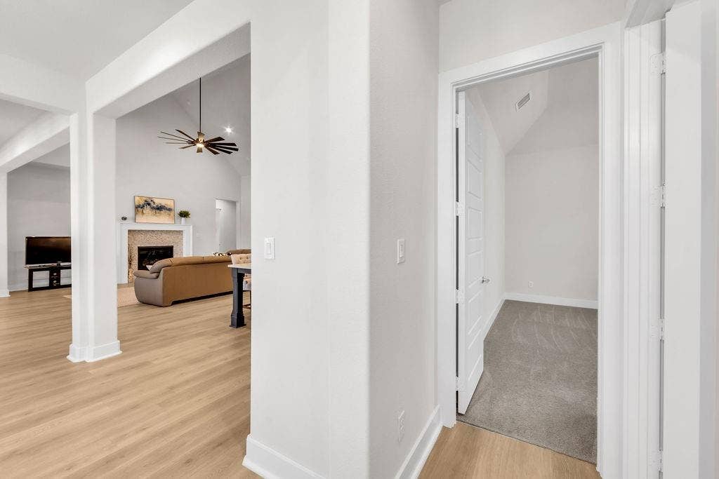 2971 Gaulding Drive, Prosper, TX 75078 Wood-finish flooring throughout, vaulted ceiling, and recessed lighting