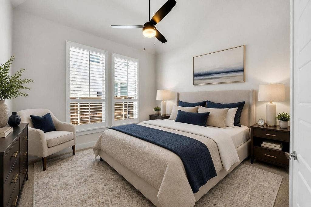 2971 Gaulding Drive, Prosper, TX 75078 Two windows with plantation shutters, a ceiling fan with integrated lighting, and neutral wall finishes