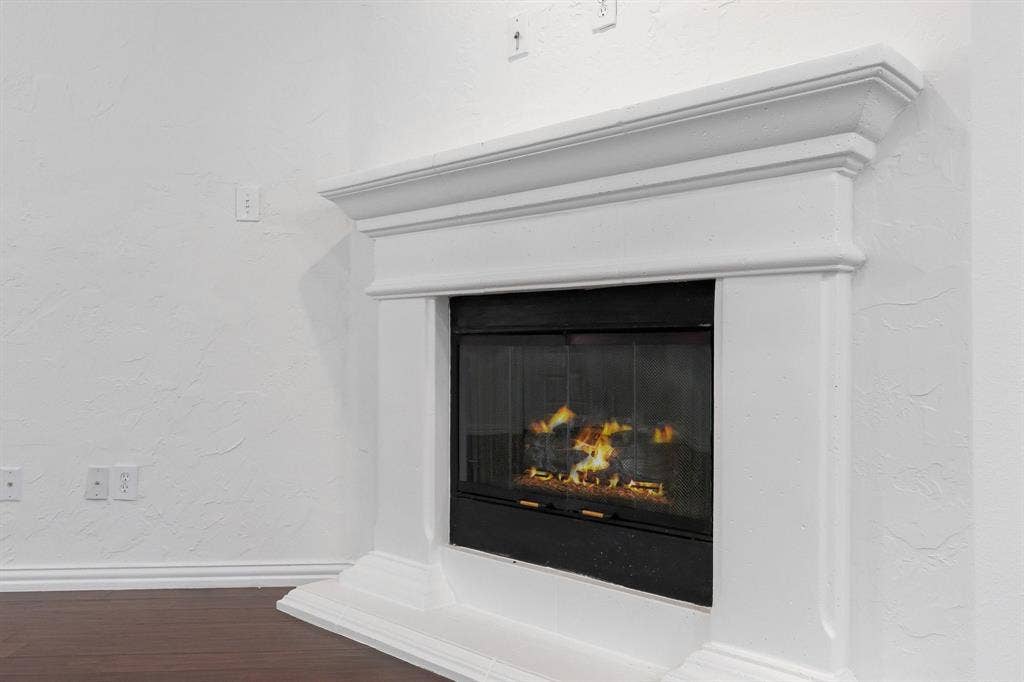 8617 Trolley Trail, McKinney, TX 75070 Easy start fireplace with switch.