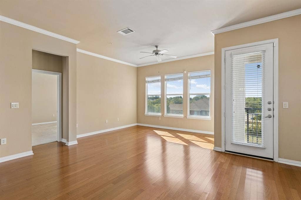 Beautiful wood flooring and natural light create a warm, welcoming atmosphere.