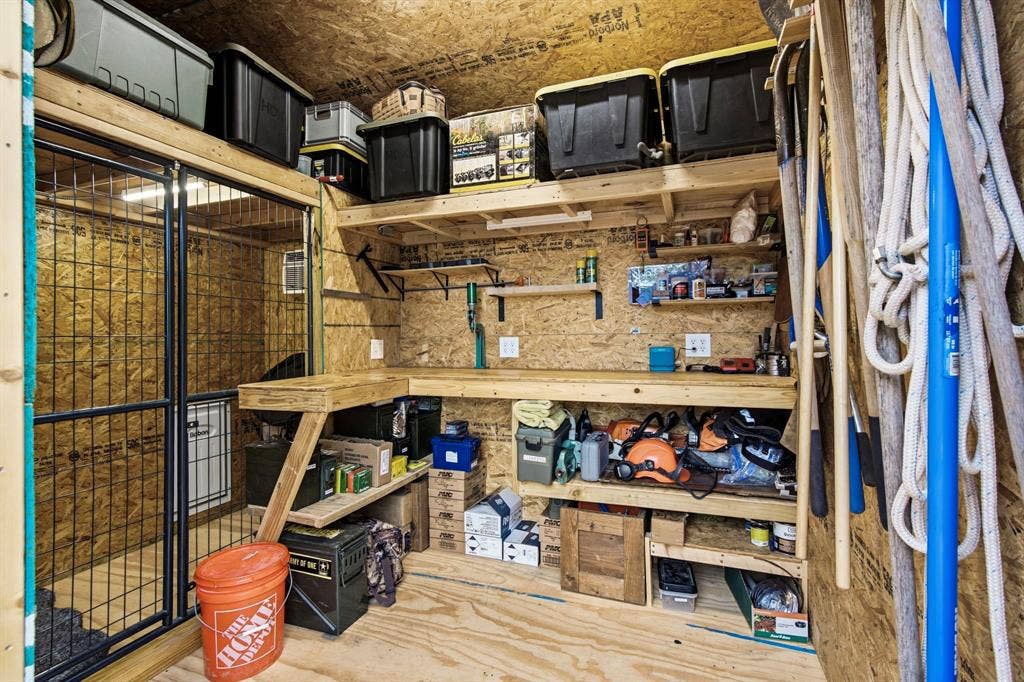 316 Zion Forest Trail, Poolville, TX 76487 Outbuilding with climate controlled dog kennel