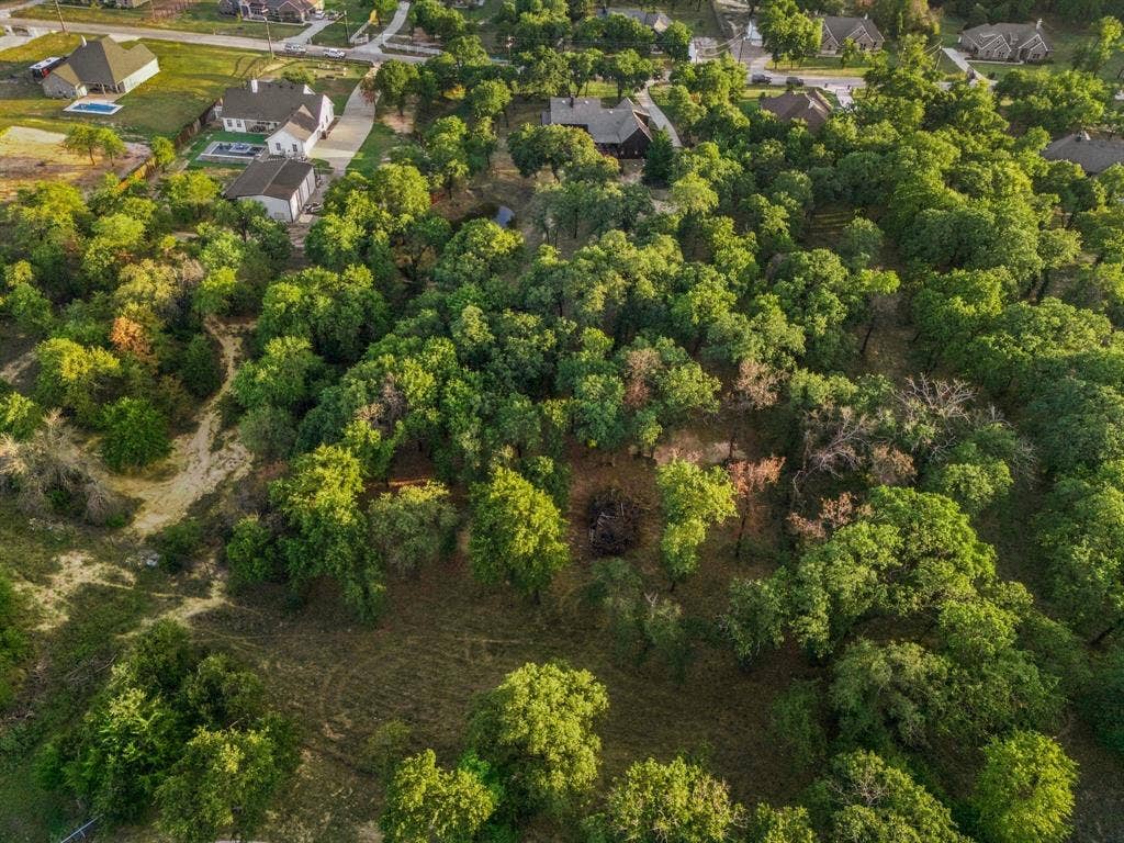 316 Zion Forest Trail, Poolville, TX 76487 Heavily wooded with 3-D archery set up