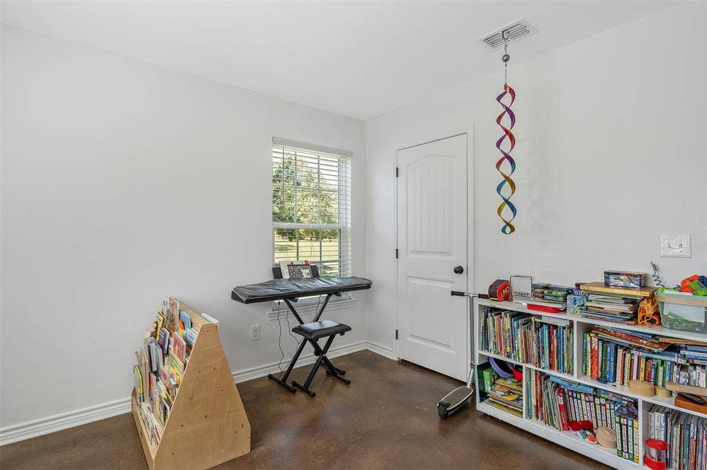19731 County Road 4130, Lindale, TX 75771 White walls, a single window with blinds, and rich, dark flooring