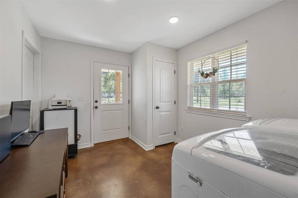 19731 County Road 4130, Lindale, TX 75771 Recessed lighting, a window with horizontal blinds, a white paneled door, and a glass-paneled door