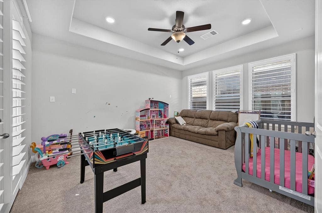 1416 White Squall Trail, Arlington, TX 76005 Tray ceiling featuring recessed lighting and a ceiling fan