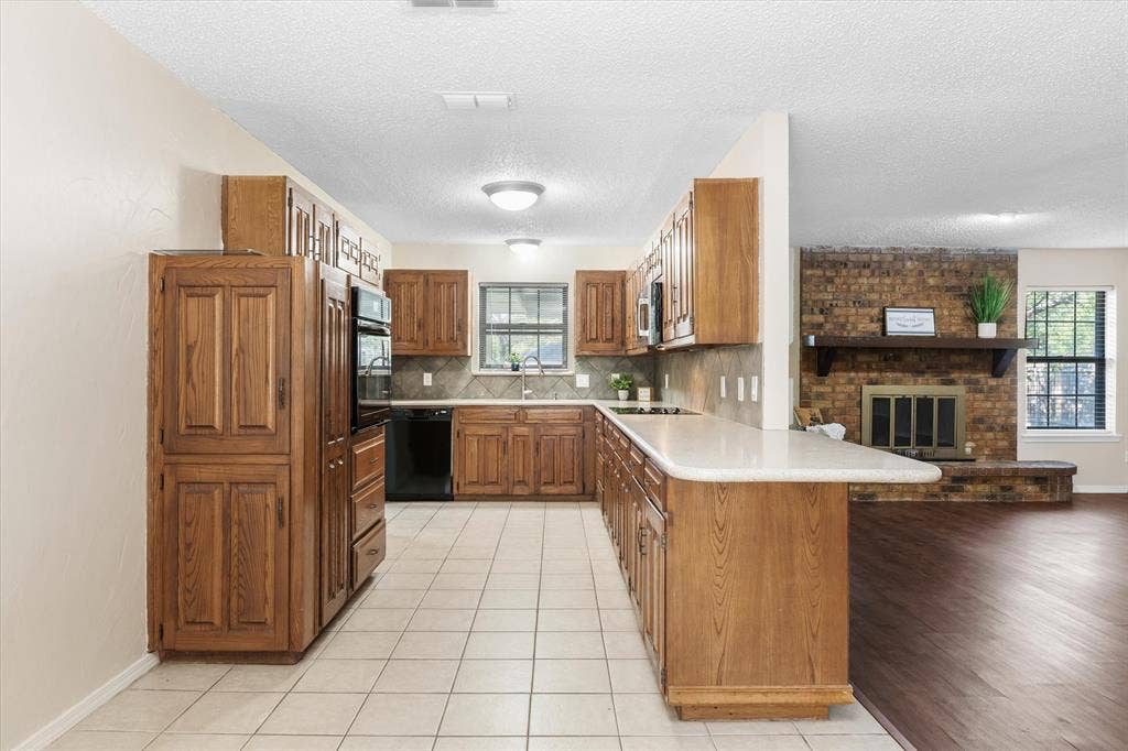 Corian countertops, oak cabinetry
