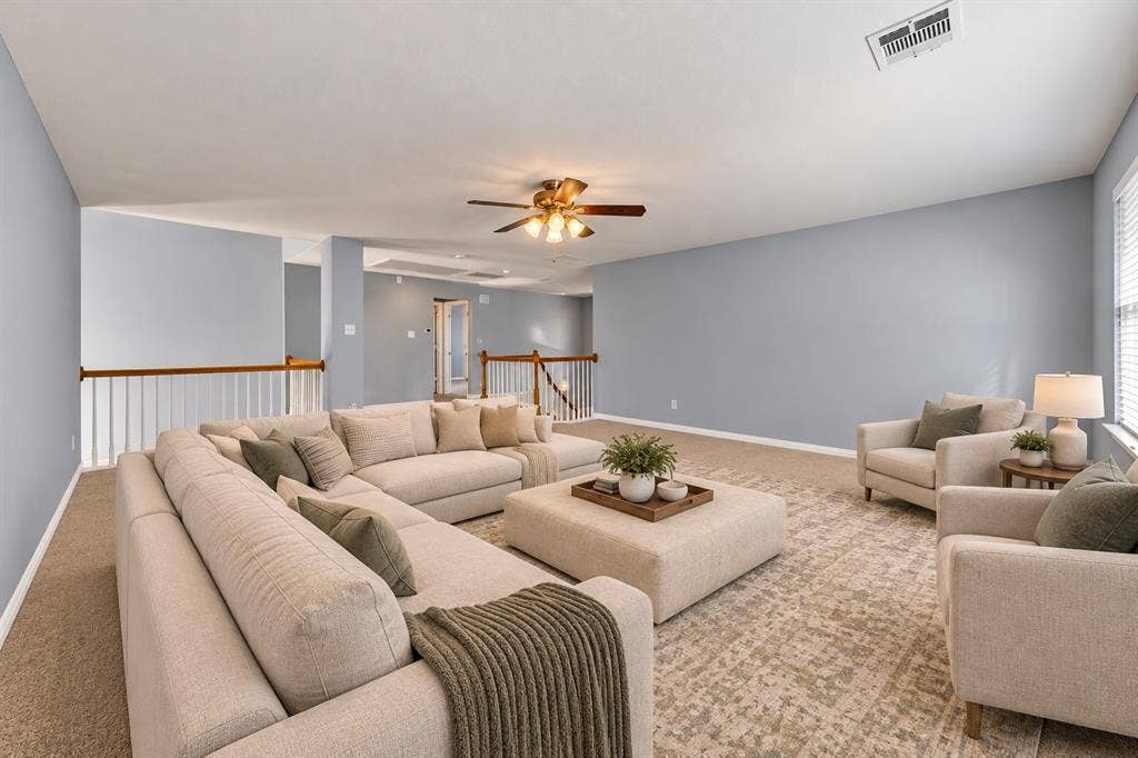 Recessed ceiling with a central ceiling fan and light fixture