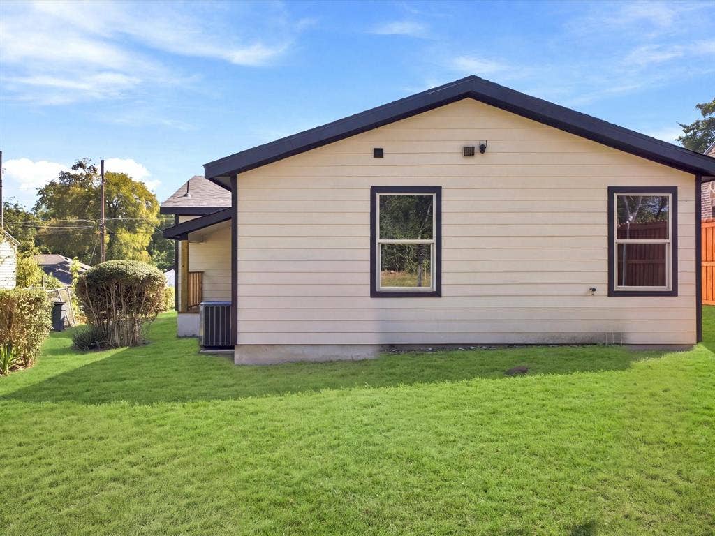 1727 Mentor Avenue, Dallas, TX 75216 Exterior featuring horizontal siding, dark-trimmed windows, a dark shingle roof, and a visible air conditioning unit