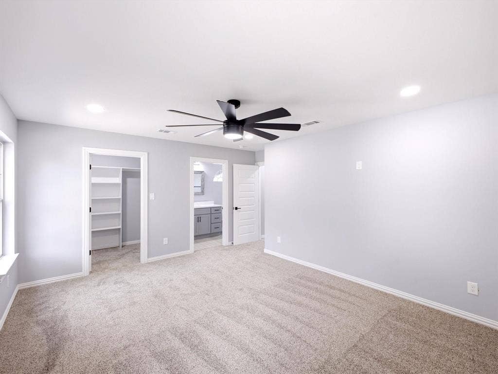 1727 Mentor Avenue, Dallas, TX 75216 Carpeted flooring, recessed lighting, ceiling fan with integrated lighting, built-in shelving, and vanity with dual sinks