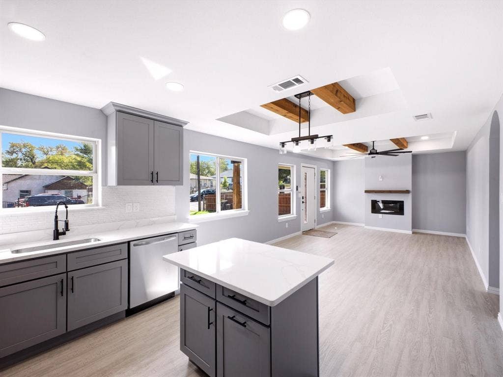 1727 Mentor Avenue, Dallas, TX 75216 Kitchen with gray cabinetry, white countertops, and stainless steel appliances