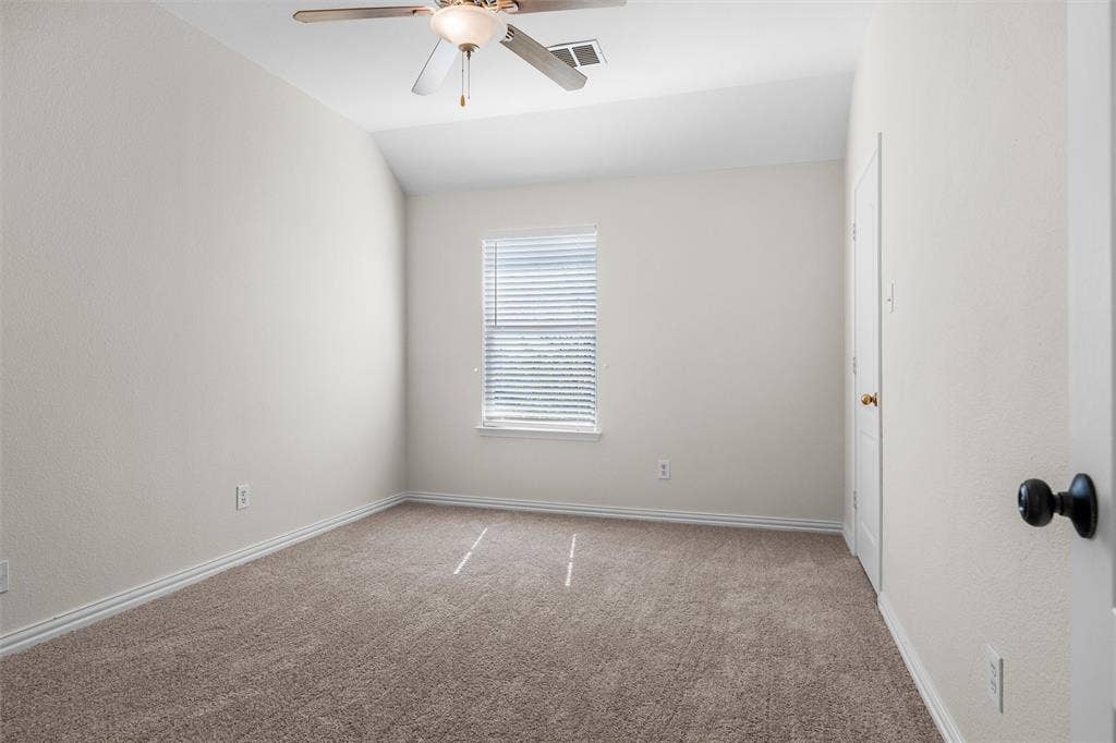 Wall-to-wall carpeting with light-colored walls