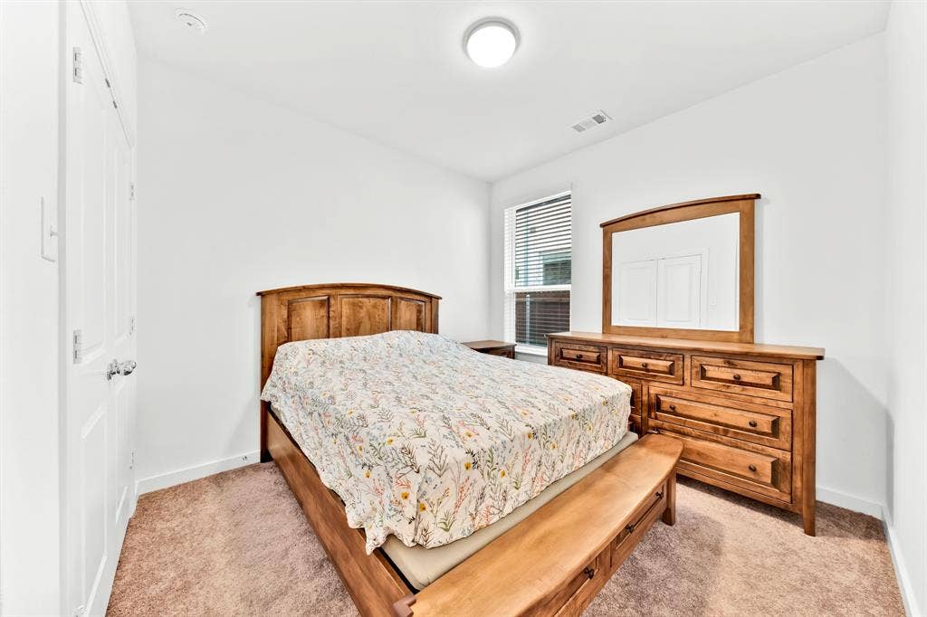 3928 Bison Lane, Crandall, TX 75114 Carpeted flooring, white walls, double-panel closet doors, and recessed lighting