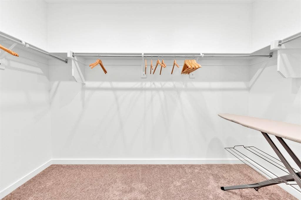 3928 Bison Lane, Crandall, TX 75114 Built-in shelving with hanging rods