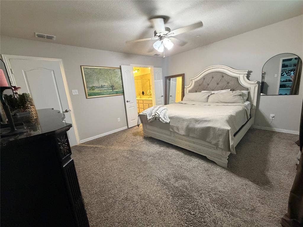 2812 Appaloosa Lane, Mesquite, TX 75150 Carpeted room with a ceiling fan