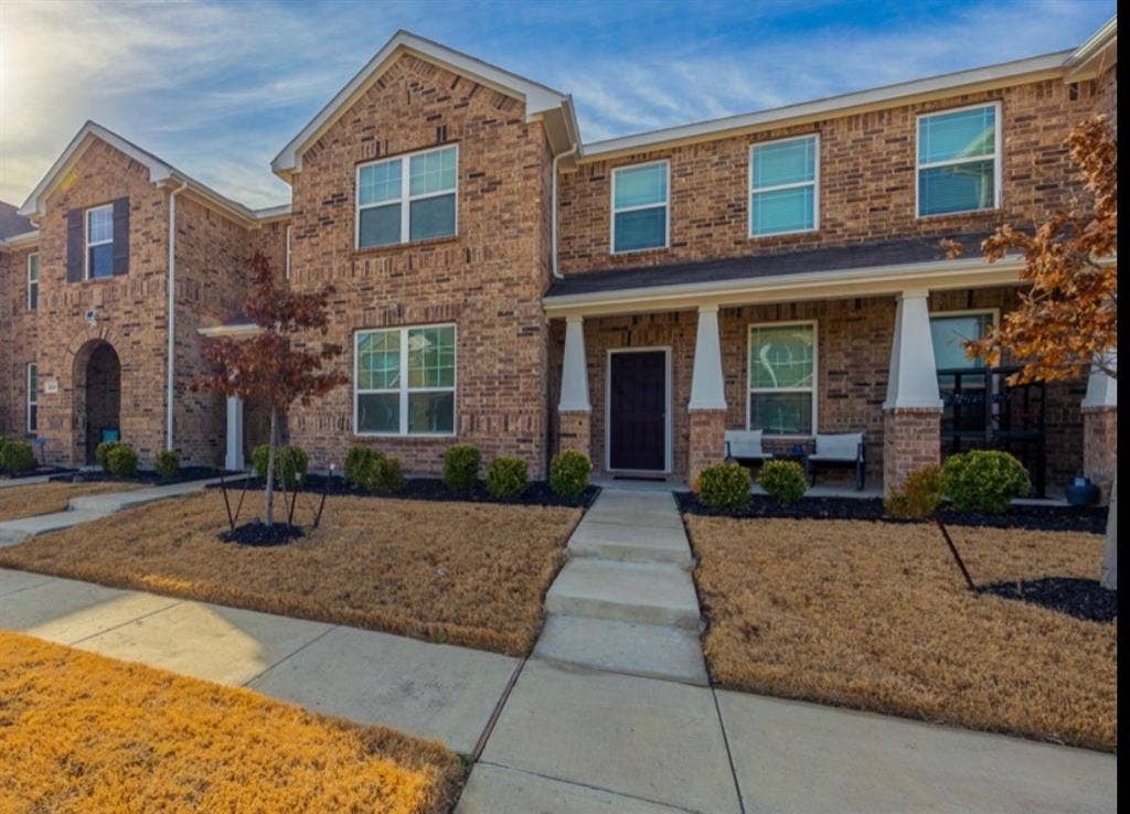 2812 Appaloosa Lane, Mesquite, TX 75150 Brick exterior with a covered front porch featuring square columns