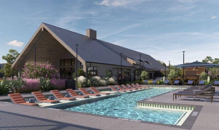 Community pool featuring a patio area