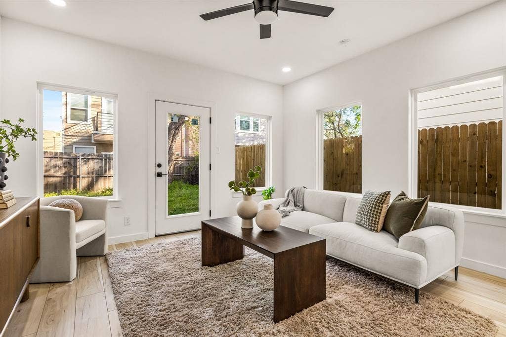 2232 Hooper Street, Dallas, TX 75215 Recessed lighting, wood-finish flooring, multiple windows, black ceiling fan, white walls