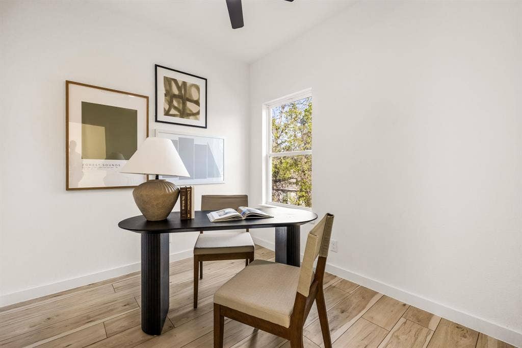 2232 Hooper Street, Dallas, TX 75215 Recessed window with natural light, wood-finish flooring, and white walls