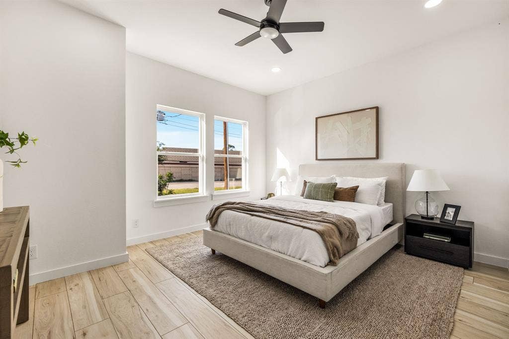 2232 Hooper Street, Dallas, TX 75215 Wood-finish flooring, recessed lighting, and a ceiling fan