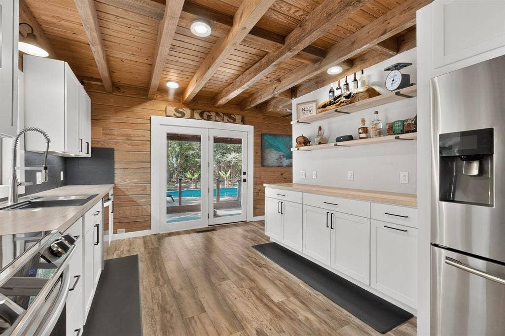 Doors overlooking Backyard Area