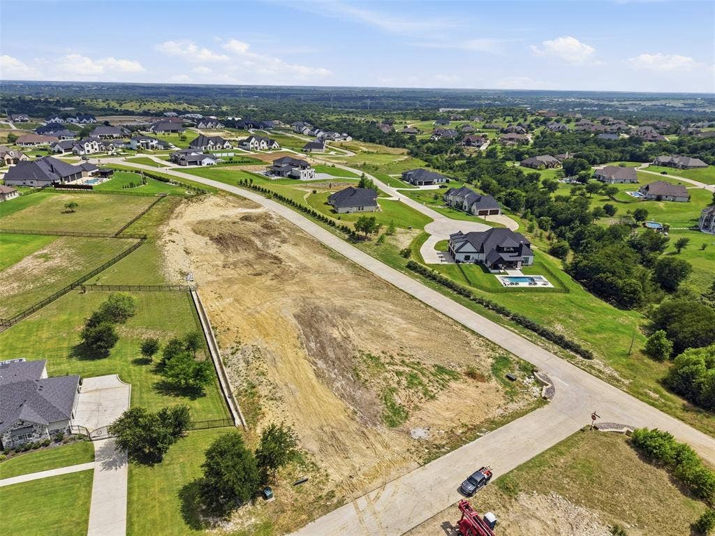 12300 Bella Quinn Drive, Fort Worth, TX 76126 Expansive undeveloped parcel located on a paved road, surrounded by established residential properties