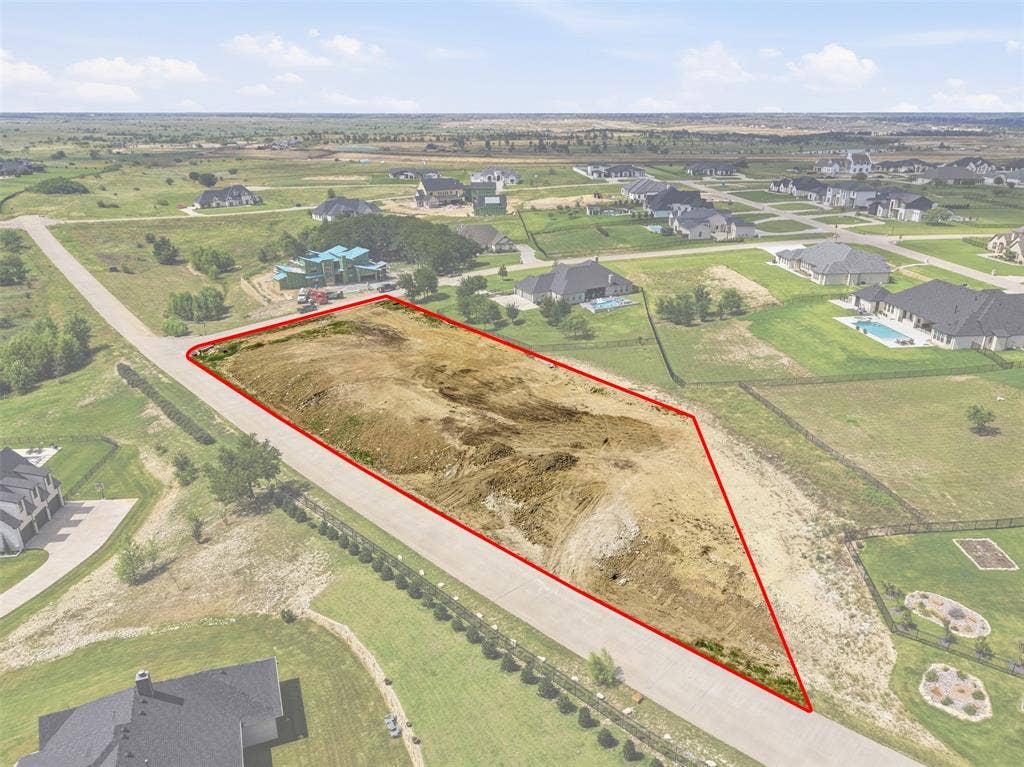 12300 Bella Quinn Drive, Fort Worth, TX 76126 Expansive land lot with clear boundaries, bordered by a paved road