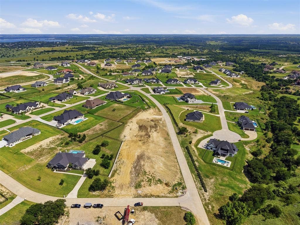 12300 Bella Quinn Drive, Fort Worth, TX 76126 Expansive residential development featuring paved roads and established homes