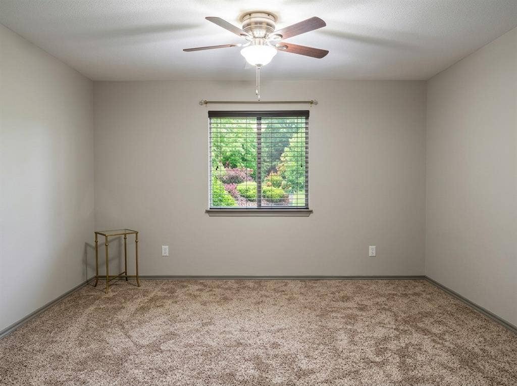 2500 Sierra Drive, McKinney, TX 75071 Neutral wall tones with a window featuring horizontal blinds