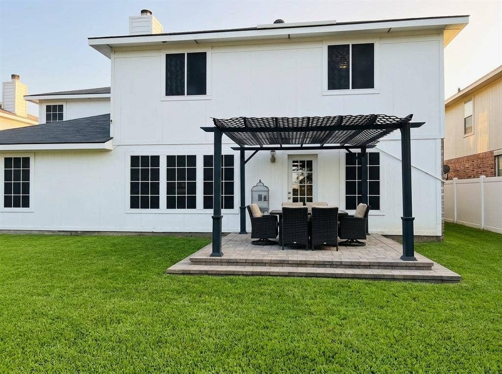2500 Sierra Drive, McKinney, TX 75071 Expansive rear exterior with a structured pergola over a raised paver patio