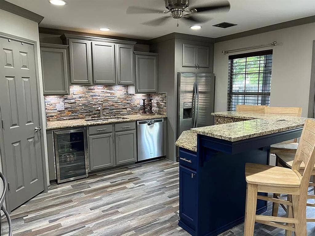 2500 Sierra Drive, McKinney, TX 75071 Kitchen featuring wood-finish flooring, undermount sink, built-in beverage refrigerator, recessed lighting, and a ceiling fan