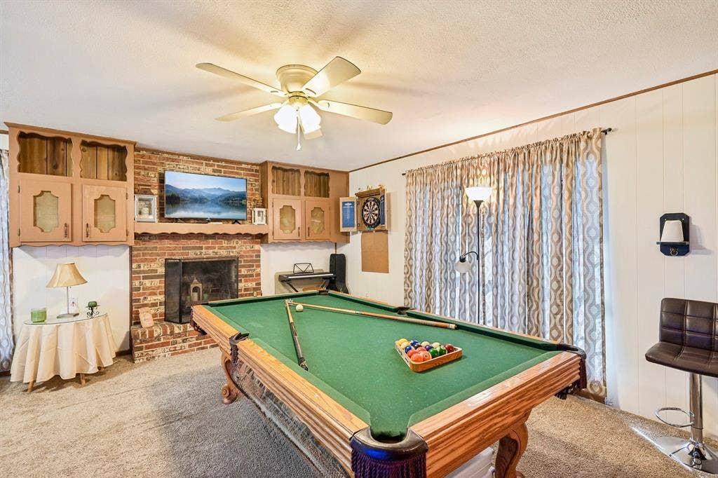 Second Living Space - Game Room with fireplace and builtins