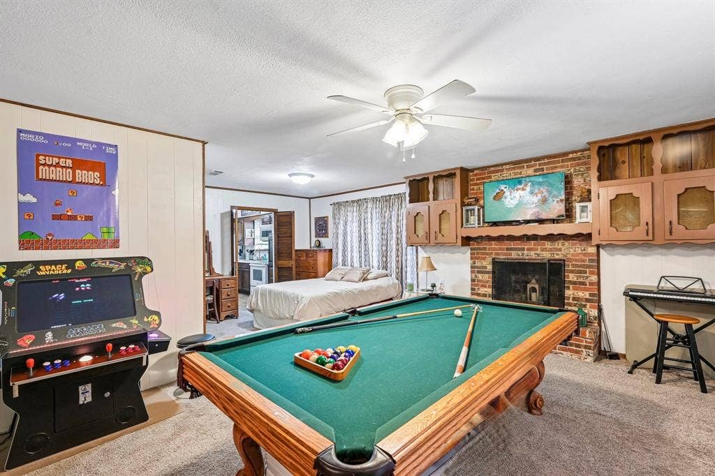 Second Living Space - Game Room with fireplace and builtins
