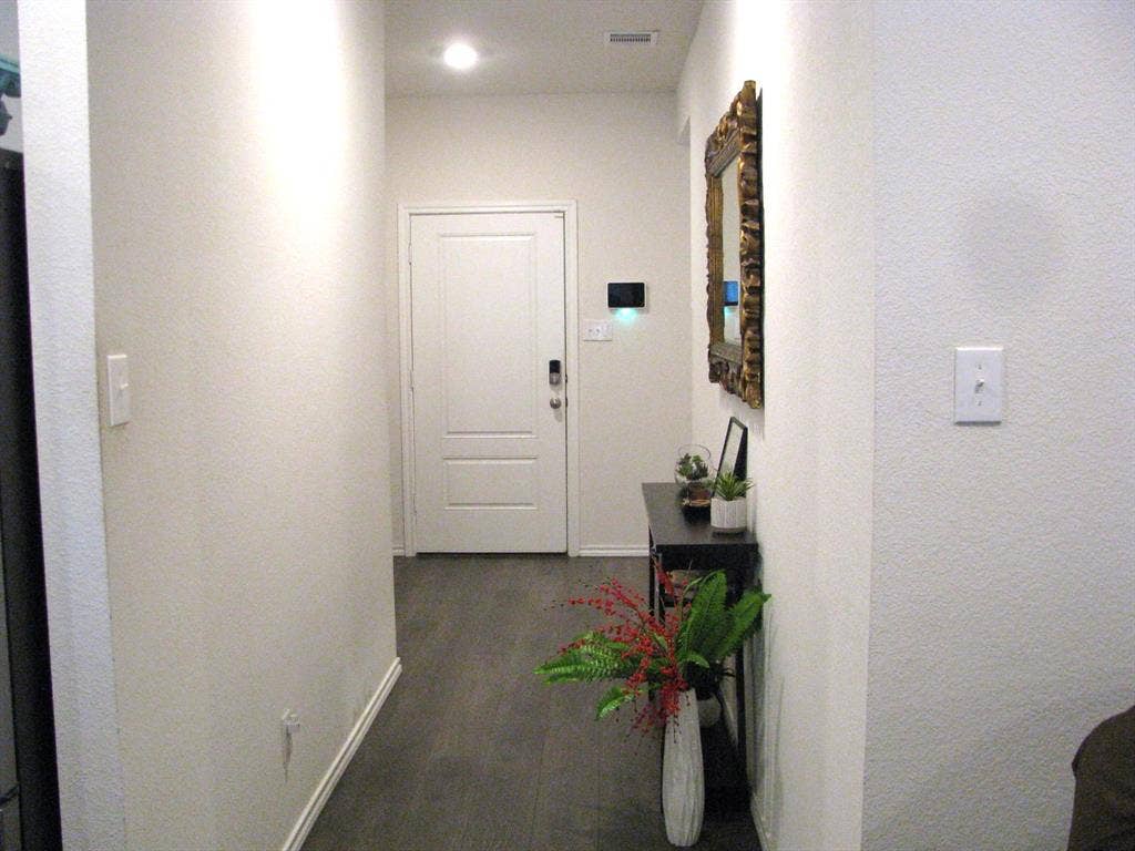 1322 Bushel Drive, Royse City, TX 75189 View of the wide and open hallway.