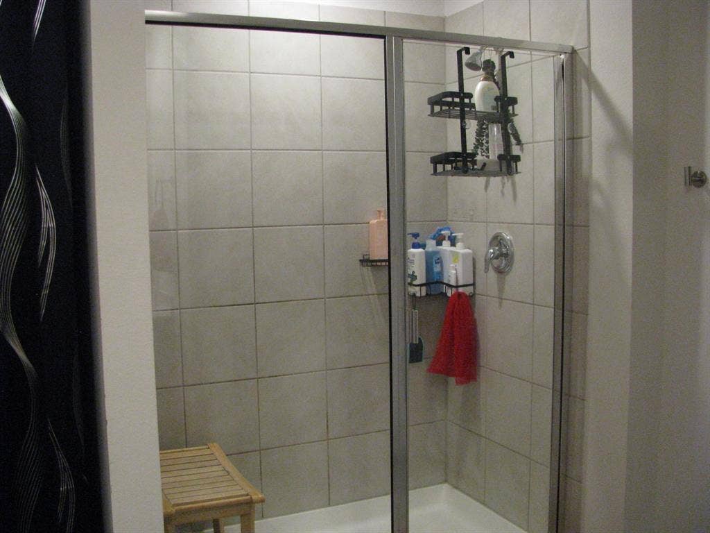 1322 Bushel Drive, Royse City, TX 75189 Master bathroom includes a large walk-in shower.
