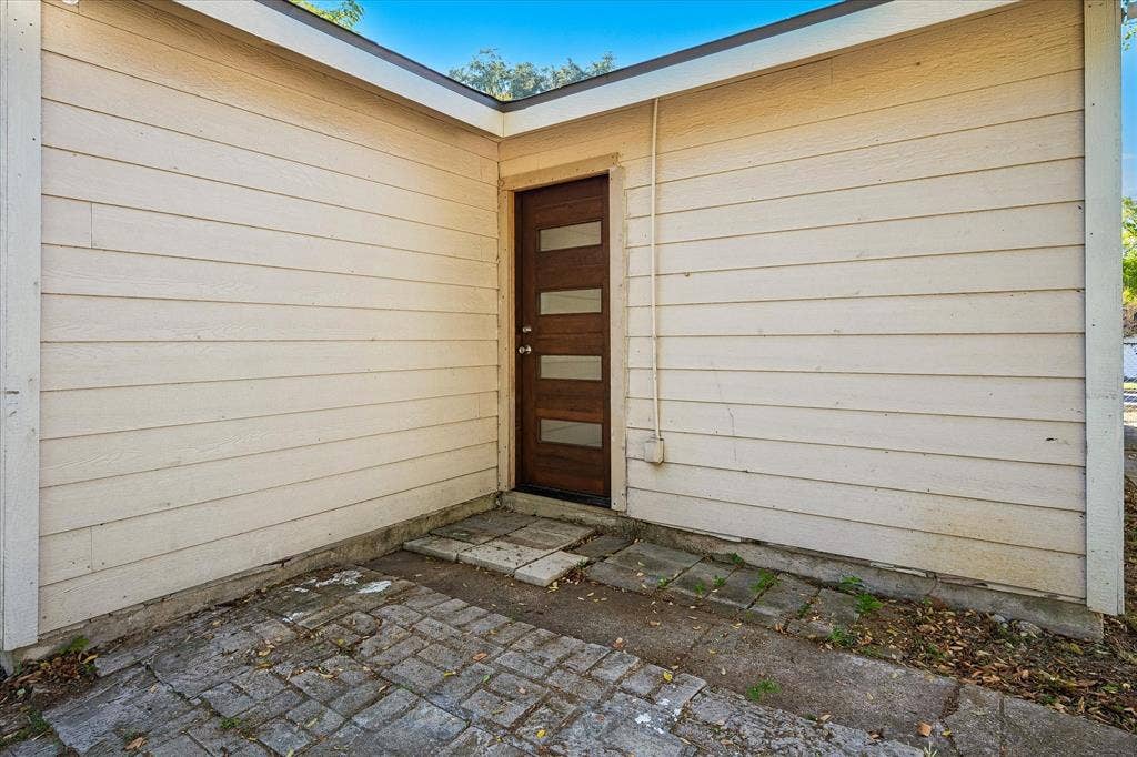 2527 Talco Drive, Dallas, TX 75241 Modern Back Door. Siding all Around.
