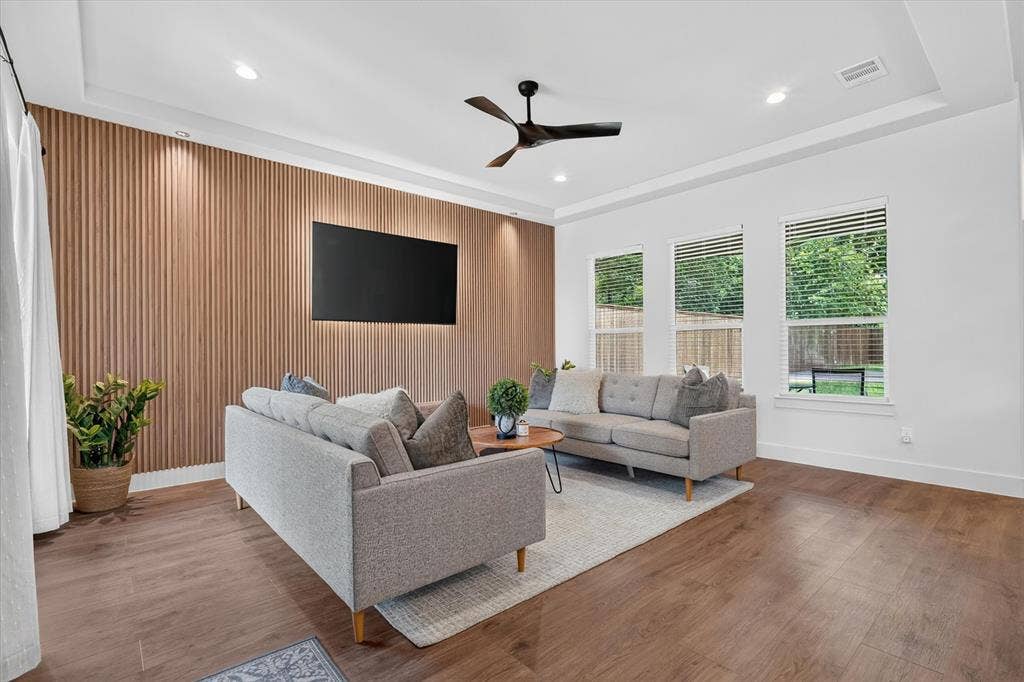 3210 Carpenter Avenue, Dallas, TX 75215 Wood-finish flooring throughout, recessed lighting, and a modern ceiling fan