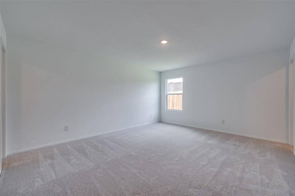 3700 Bluebird Lane, McKinney, TX 75071 View of carpeted empty room