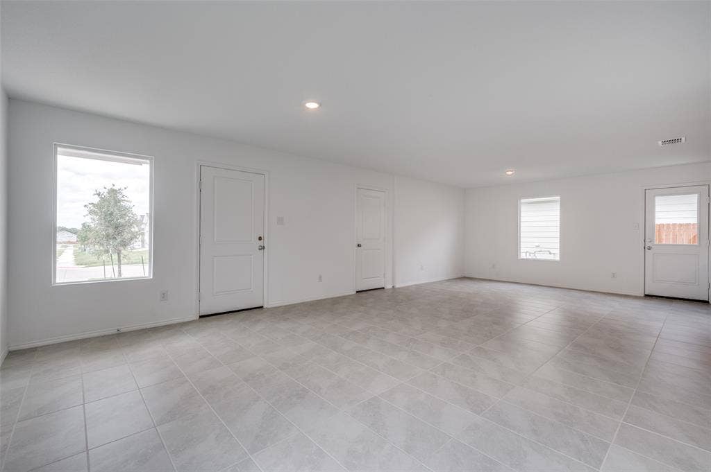 3700 Bluebird Lane, McKinney, TX 75071 Spare room featuring light tile floors