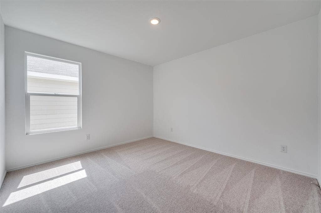 3700 Bluebird Lane, McKinney, TX 75071 View of carpeted spare room