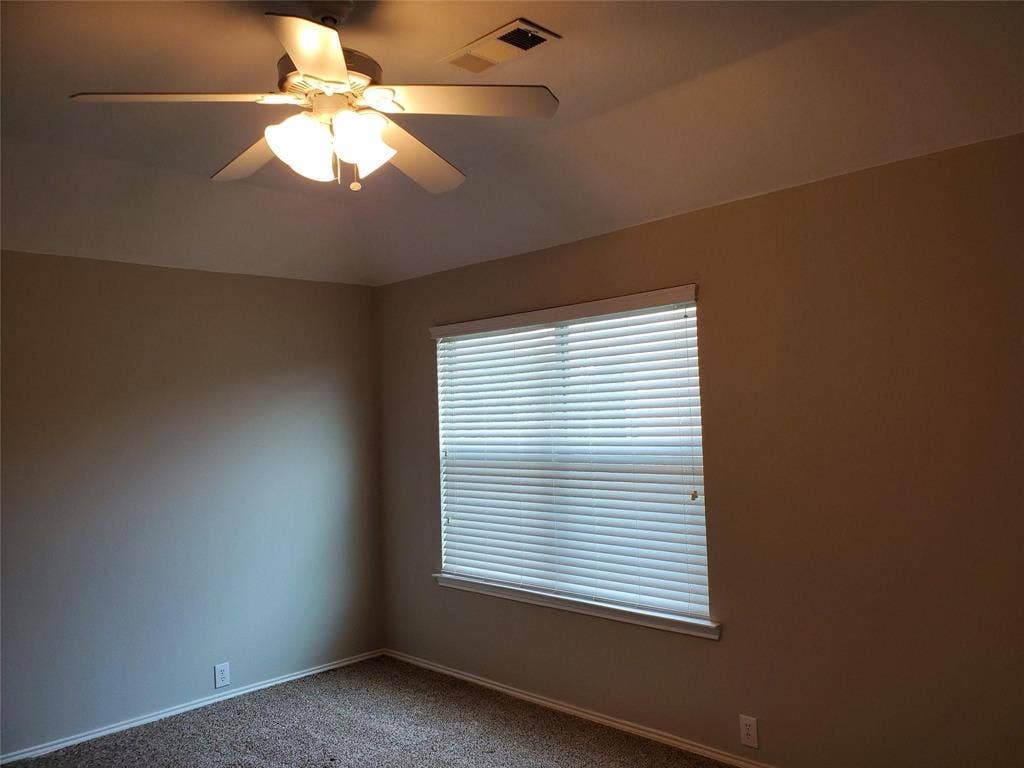 2077 Sleepy Hollow Trail, Frisco, TX 75033 Carpeted spare room with ceiling fan