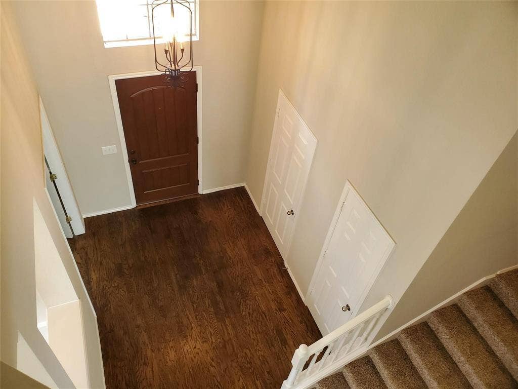 2077 Sleepy Hollow Trail, Frisco, TX 75033 Foyer entrance with dark hardwood / wood-style flooring