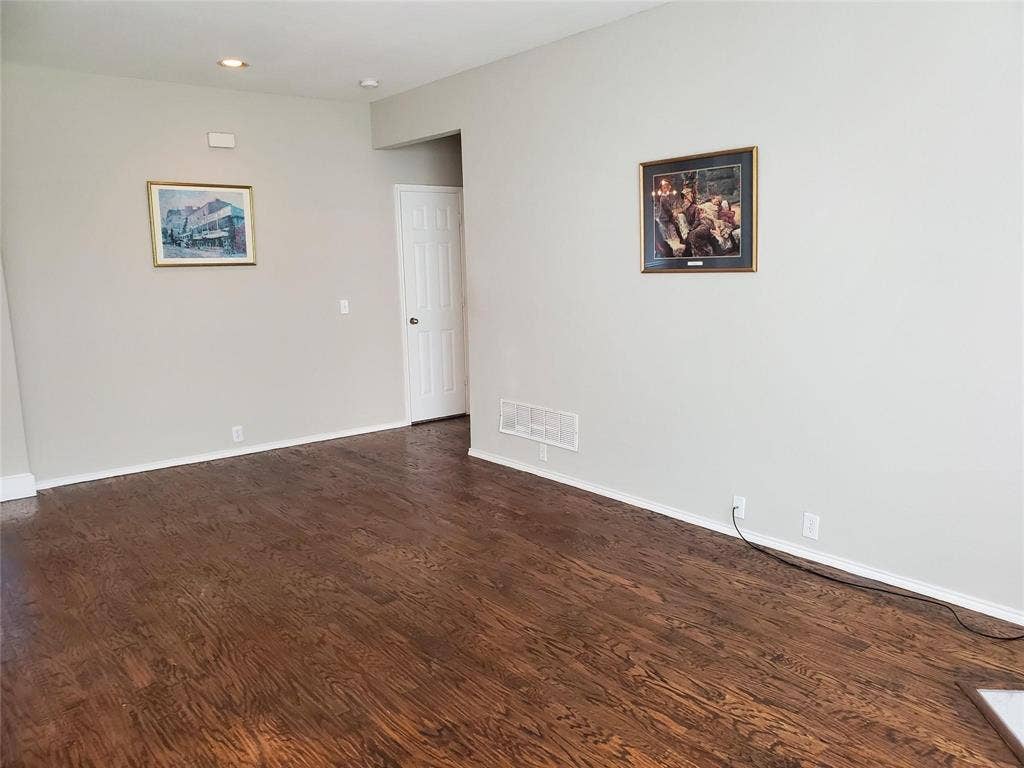 2077 Sleepy Hollow Trail, Frisco, TX 75033 Spare room featuring dark hardwood / wood-style flooring