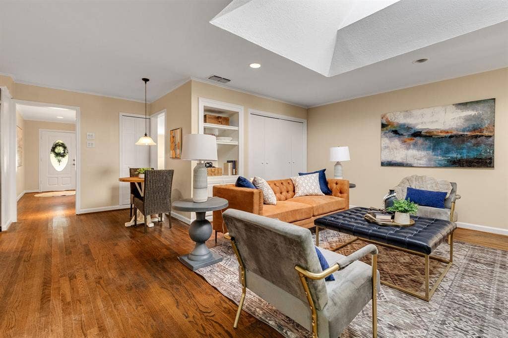 824 Westwood Drive, Richardson, TX 75080 Beautiful! This view is from the corner of the family room looking towards the front of the house with a peek of the entry way and front door.