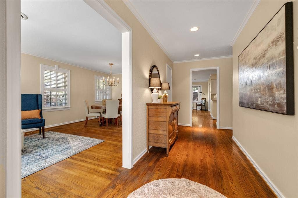 824 Westwood Drive, Richardson, TX 75080 Come on inside and notice the gorgeous real nail down hardwood flooring, fresh paint throughout October 2026, crown molding, recessed lighting & extensive custom molding.