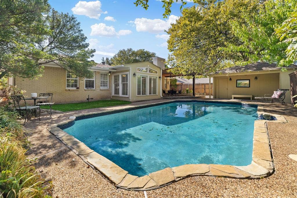824 Westwood Drive, Richardson, TX 75080 A great view from the back corner of the yard looking towards the house.
