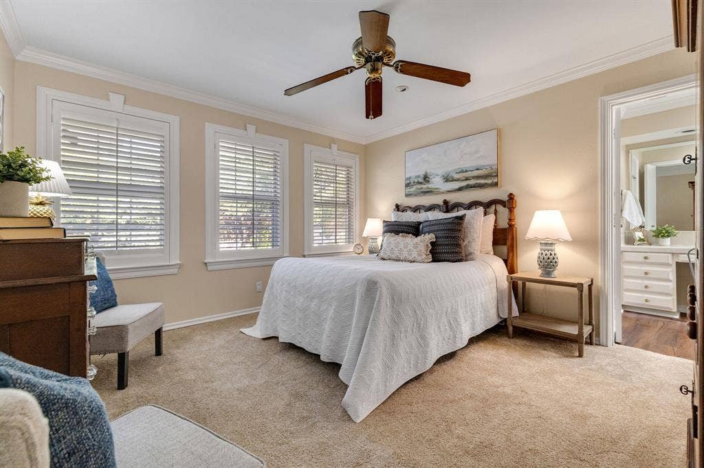 824 Westwood Drive, Richardson, TX 75080 What a beautiful and relaxing primary suite with fresh paint, brand new carpet and custom plantation shutters. The seller also mentioned that there are wood floors underneath the carpet as well.