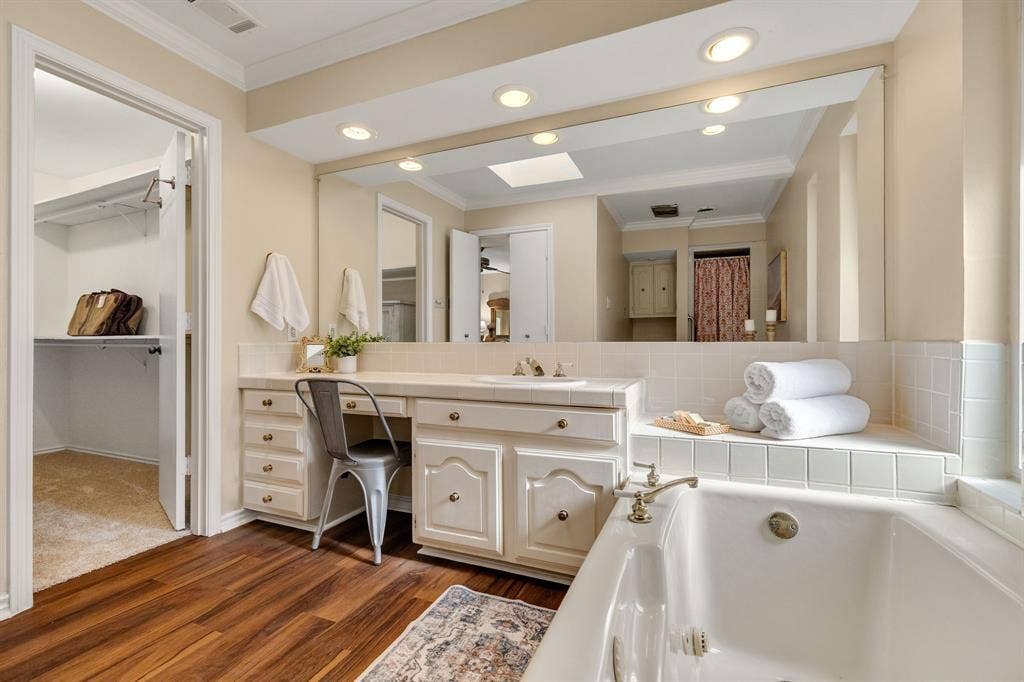 824 Westwood Drive, Richardson, TX 75080 The walk-in closet to the left of the primary bathroom is large. Plus, there is another spacious closet located inside the primary bedroom.